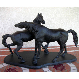 Statue accolade en fonte 